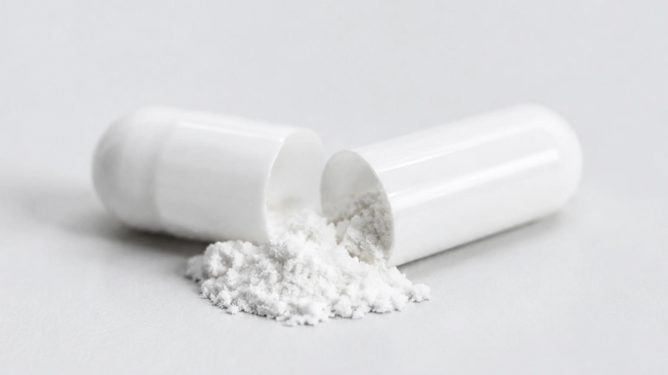 Open white capsule with pure ergothioneine powder